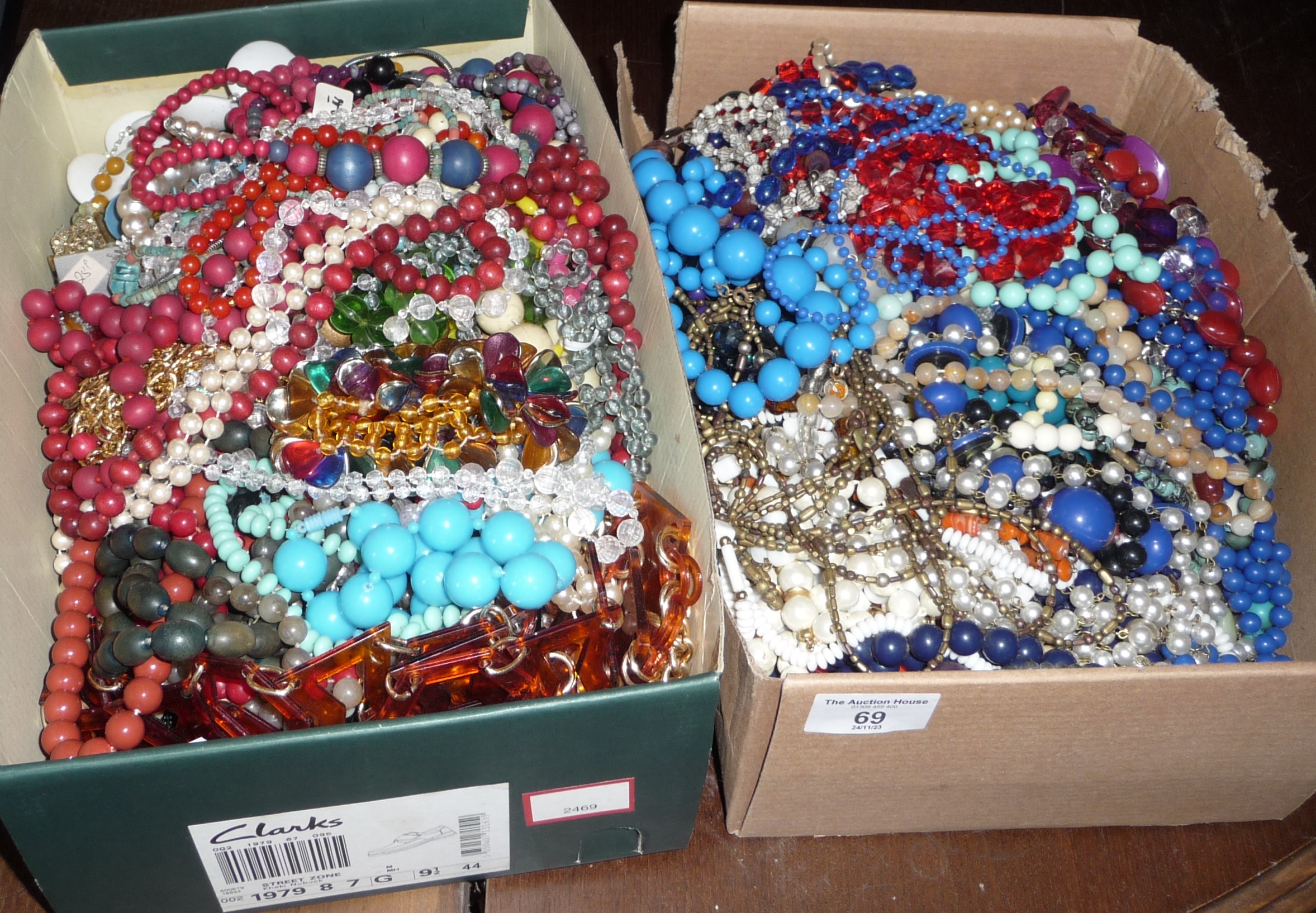 Two boxes of costume jewellery necklaces