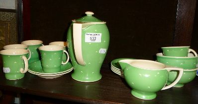 A Susie Cooper coffee set in green crescents pattern