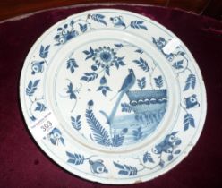 18th c. Dutch Delft plate with floral and bird decoration, 23cm diameter