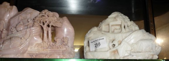 Chinese soapstone carving and a similar pink marble carving