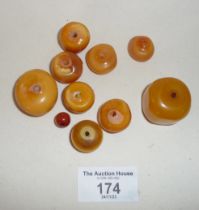 10 various sized amber beads, weight approx 60gms