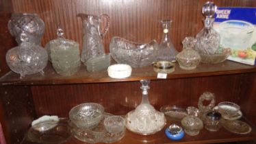 Two shelves of assorted cut glass