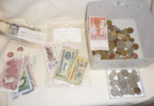 Banknotes and coins including 10/-, £1's, old Chinese Yuan, Philippine Pesos, assorted foreign