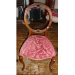 19th c. carved walnut balloon backed dining chair with upholstered seat above cabriole legs