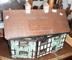 Early 20th c "Tudor" dolls house with fitted and illuminated interior