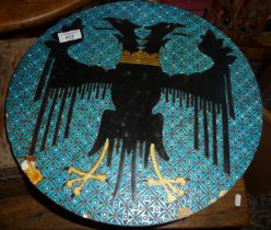 Heavy glazed armorial circular wall plaque depicting Imperial eagle