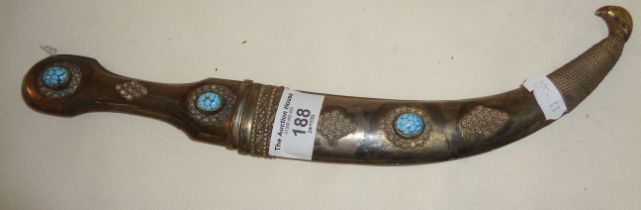 A jambiya with white metal scabbard set, with turquoise stones