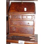 Apprentice piece walnut model of a bureau on bracket feet, 10" high x 8" wide