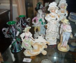 Five various china figurines and a pair of "end of day" glass vases