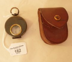 Marching compass in leather case