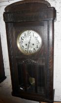 Oak cased 8-day wall clock, striking on a gong with glass door enclosing pendulum