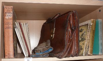 Leather briefcase, suede driving gloves and assorted books and maps including "Romany Cottage,