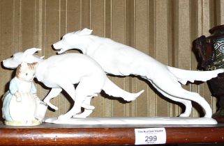 A Kaiser porcelain figurines of two running Irish Setters together with a Royal Albert "Ribby and