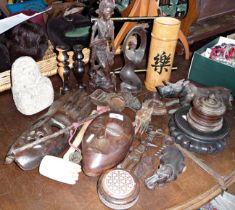 Large collection of assorted wood ornaments and figurines including Tribal Art masks, turned ebony