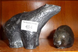 Inuit stone carving of a polar bear and a resin beaver