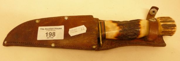 A horn handled sheath hunter/skinner knife made by George Wostenholme, Sheffield