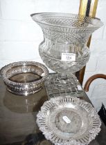 A silver plated wine coaster and dish, together with a Victorian cut glass champagne cooler on