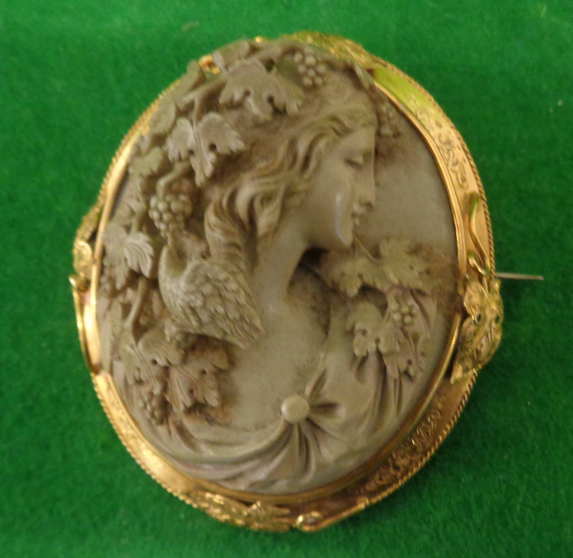 Victorian gold-mounted high relief lava cameo of a pre-Raphaelite lady's head, 5.25cm x 4.5cm