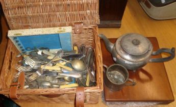 Basket of assorted cutlery, etc.