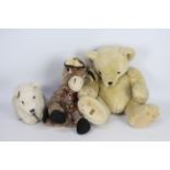 Merrythought - A trio of Merrythought soft toys.