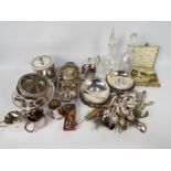 A quantity of plated ware, flatware, two decanters and other, generally good condition,