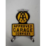 A wall mountable key hook marked AA Approved Garage Services, approximately 21 cm (h),