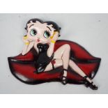 A wall mountable, cast iron model depicting Betty Boop, approximately 19 cm (l),