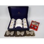 Lot to include a boxed set of Royal Worcester commemorative coffee cans and saucers,