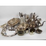 A collection of plated ware to include teapot, coffee pot and other, some plating loss in areas.