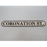 A cast iron street sign, Coronation Street, approximately 8 cm x 62 cm,