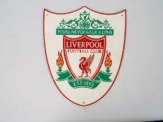 A cast iron wall plaque marked Liverpool Football Club, 33 cm x 27 cm,