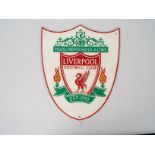 A cast iron wall plaque marked Liverpool Football Club, 33 cm x 27 cm,