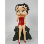 A cast iron, shelf sitting figure depicting Betty Boop singing, 28 cm (h),