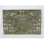 A cast iron doormat, approximately 45 cm x 69 cm,