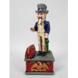 A cast iron money bank in the form of Uncle Sam, approximately 26 cm (h),