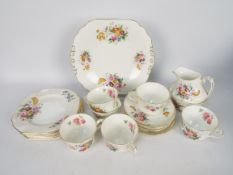 Coalport - A collection of tea wares in the Junetime pattern, 21 pieces,