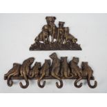 Two sets of bronzed, cast iron, key hooks, one depicting cats, the other dogs,
