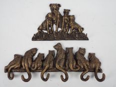 Two sets of bronzed, cast iron, key hooks, one depicting cats, the other dogs,