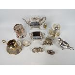 A collection of various plated table wares.