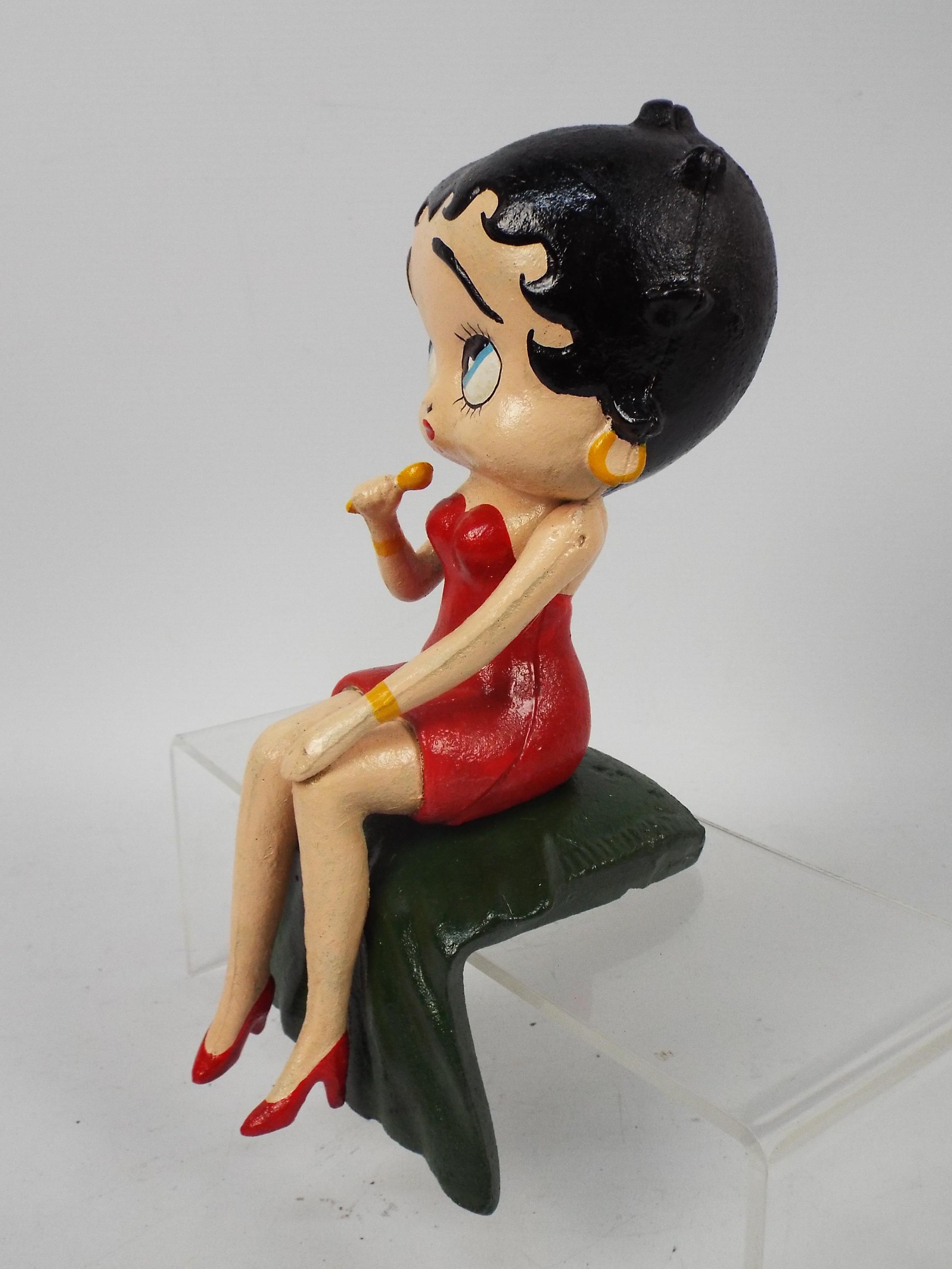 A cast iron, shelf sitting figure depicting Betty Boop singing, 28 cm (h), - Image 4 of 5