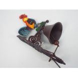 A cast iron, wall mountable, bell with cockerel decoration, approximately 45 cm (h),