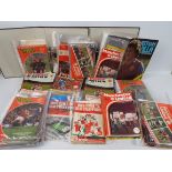 Manchester United - A large quantity of programmes, 1970's and later, one box and two binders.