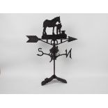 A cast iron weather vane with horse and blacksmith decoration, approximately 65 cm (h),