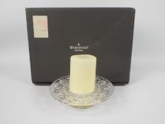 A Waterford Crystal Bethany candle holder, with box and candle, appears in good condition,