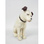 A cast iron money bank in the form of Nipper, the HMV dog, approximately 24 cm (h),