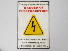 A novelty, cast iron sign, Danger Of Electrocution, 29 cm x 20 cm,