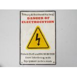 A novelty, cast iron sign, Danger Of Electrocution, 29 cm x 20 cm,