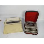 A Brother electric typewriter and a vintage Empire Corona portable typewriter in carry case.