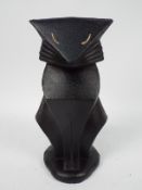 A cast iron, Art Deco style doorstop in the form of a cat, approximately 26 cm (h),