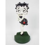 A cast iron door stop in the form of Betty Boop, approximately 36 cm (h),
